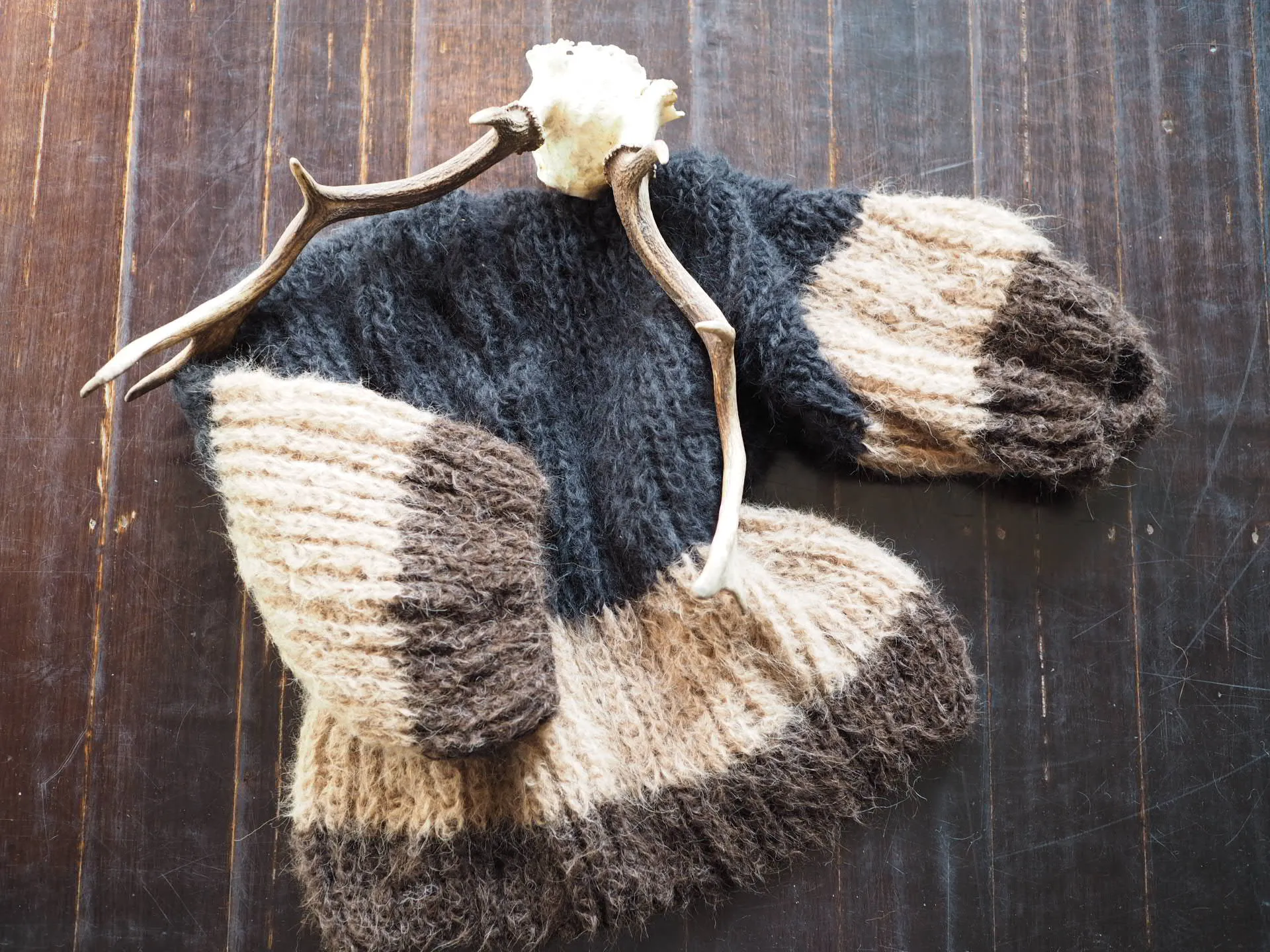 Hand knit alpaca V neck sweater with tri stripe